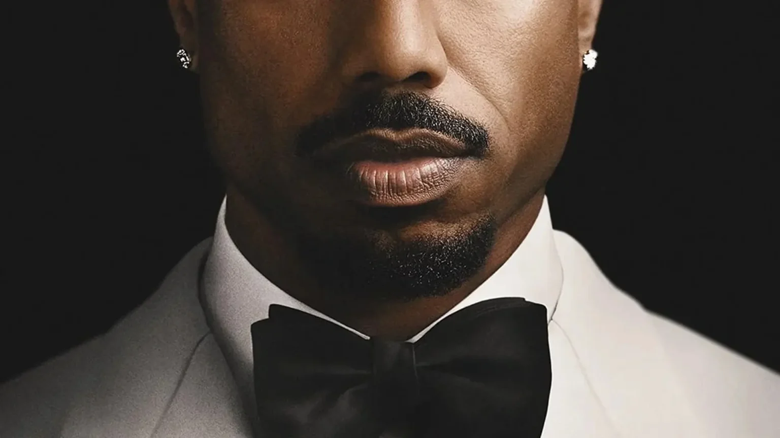 Michael B. Jordan apresenta pôster oficial do remake de “The Thomas Crown Affair” com estreia prevista para 2027